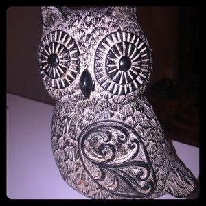A HOME OR ROOM DECOR ITEM ( AN OWL)
